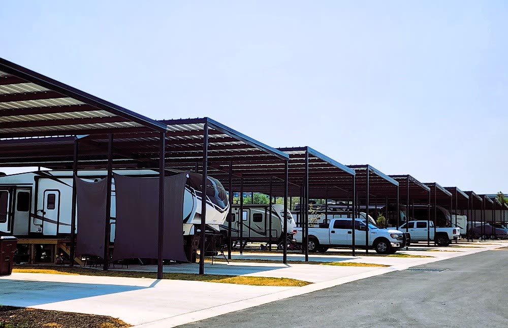 Shaded RV site under mature trees